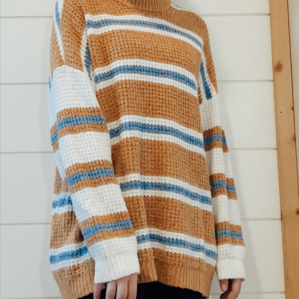 striped blue, brown, and white sweater